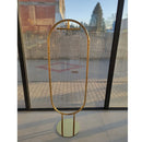 Ovalus auksinis stovas su kabykla bikono