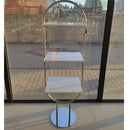 Sidabrinės spalvos ovalus stovas su lentynomis roosii