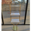 Aukso spalvos ovalus stovas su lentynomis Cotini