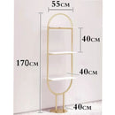 Aukso spalvos ovalus stovas su lentynomis Cotini